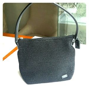 Black hand bag by -The Sak ,